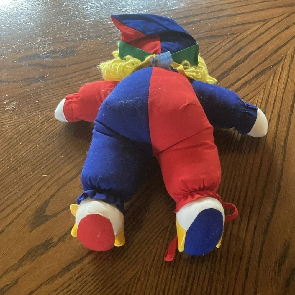 90’s learn and play clown plush primary colors